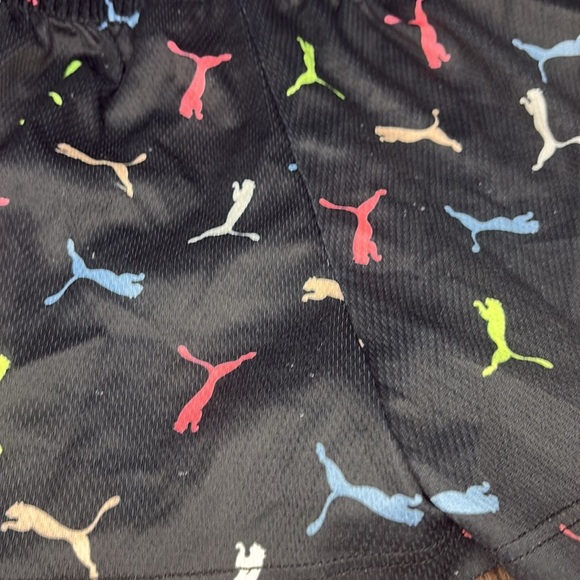 Puma athletic shorts size small with multicolor Puma logos on them - Picture 3 of 5